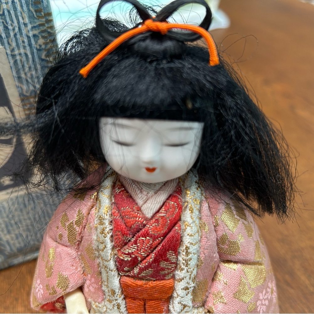 Collectors Traditional Japanese Doll, Pink and Orange Kimono. China hands, face.